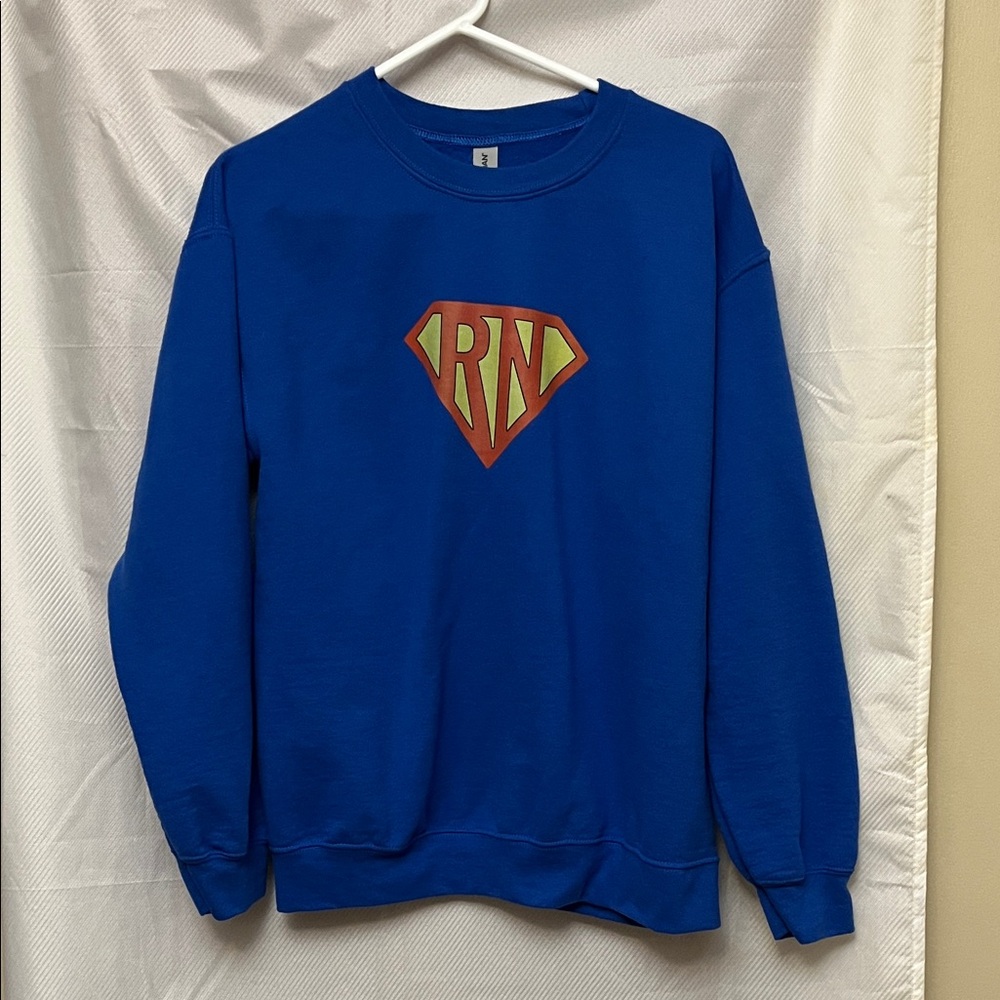 Blue Superhero Logo Women’s Sweatshirt M.   X7